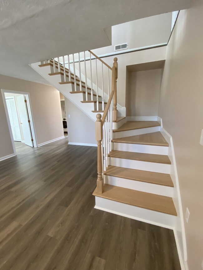 Open custom staircase leads to loft area - 400 Massachusetts Ave