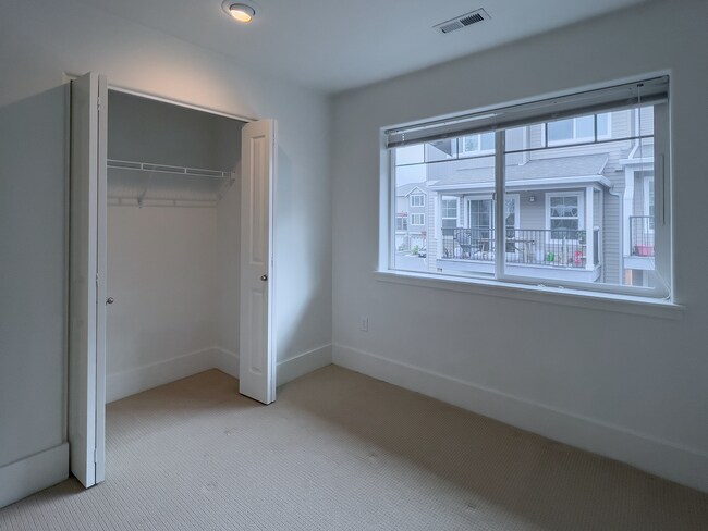 Building Photo - Enjoy this 3 Bedroom 2.5 Bathroom End Townhome ~ 2 Car Garage + Washer & Dryer! Great Cedar Mill ...