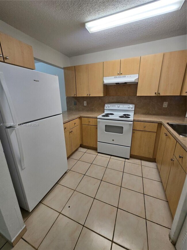 Building Photo - 6151 W 24th Ave