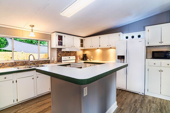 Building Photo - Home on half acre with land and storage