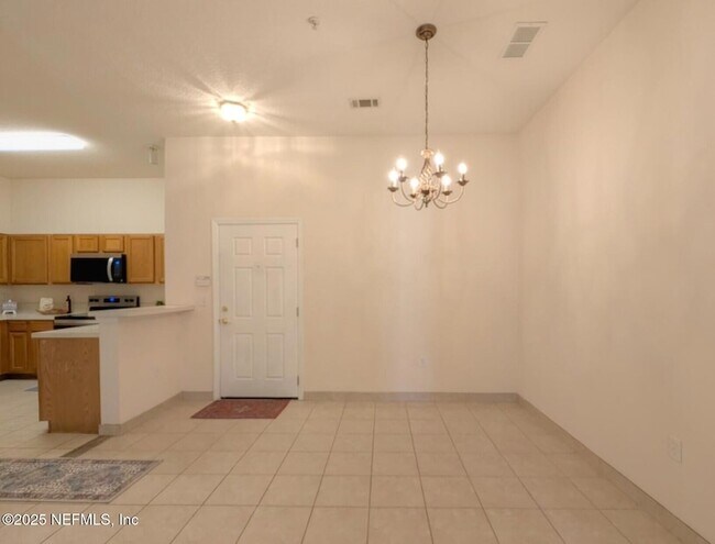 Building Photo - 9595 Amarante Cir