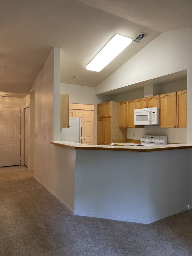 Building Photo - Bright, Spacious, Updated Condo with Separ...