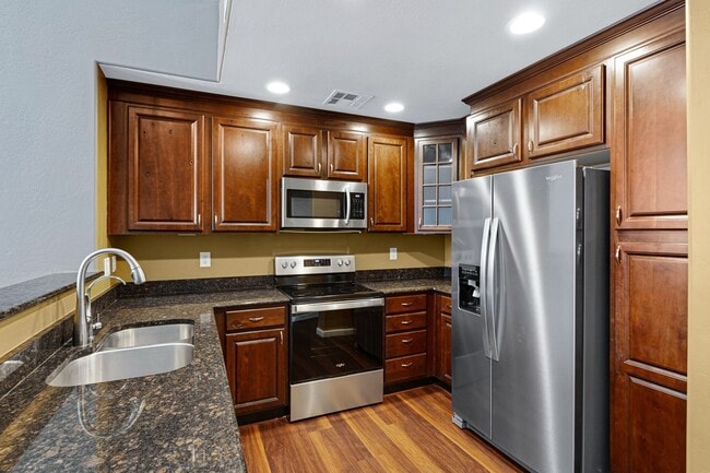 Building Photo - Modern Tri-Level Townhome in Copper Leaf C...