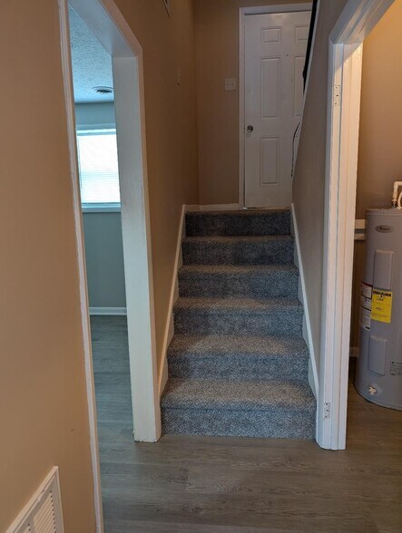 Stairs to Kitchen - 105 Windy Cir