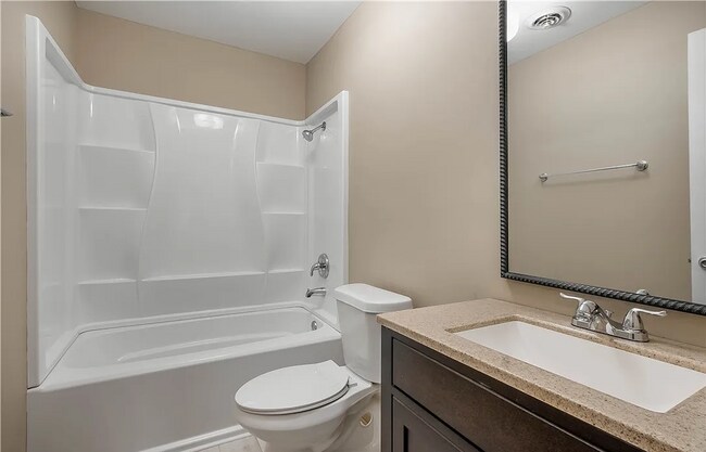 Building Photo - This Charming Two-Story Home Awaits You