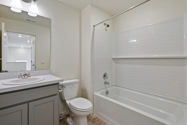 Building Photo - Spacious 4-Bedroom Wellington Home with 3-Car Garage, Loft & Fenced Backyard!