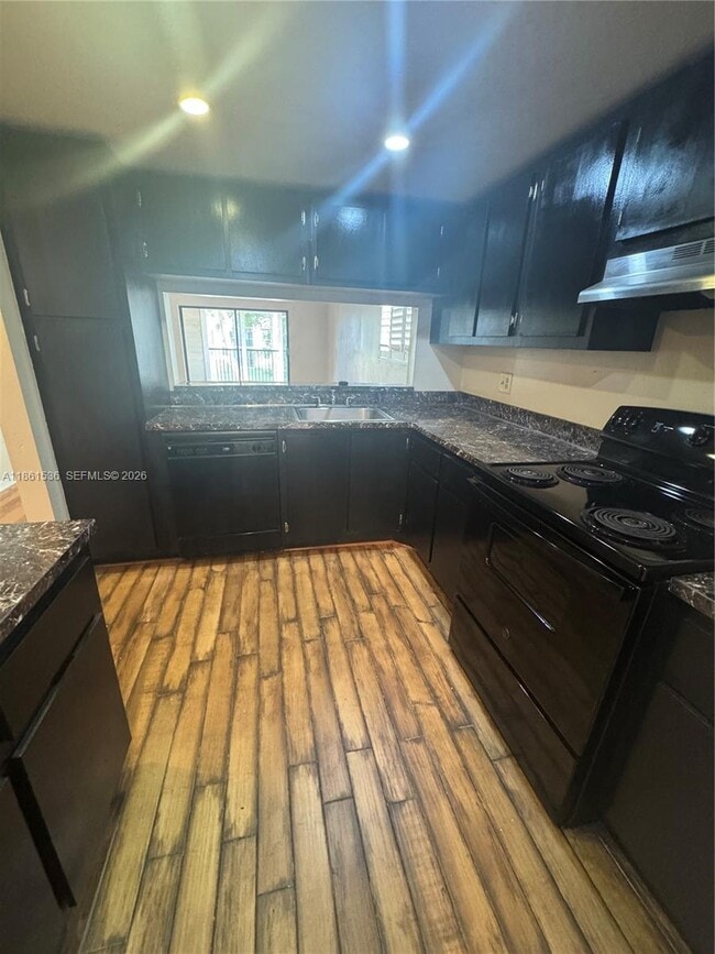 Building Photo - 6575 W Oakland Park Blvd