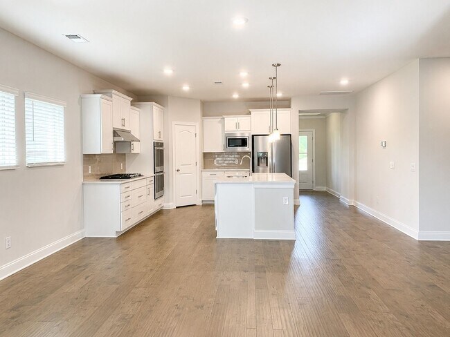 Building Photo - Available NOW!  Stunning 4 bed, 2.5 bath residence in the highly sought-after Foxland Harbor Golf...