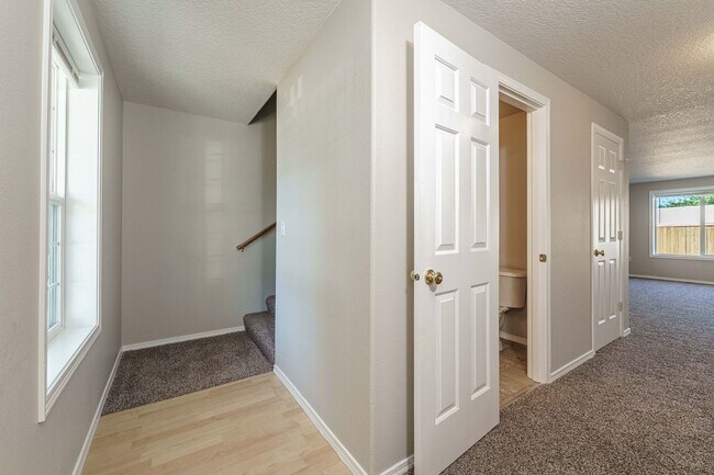Building Photo - Your Next Home Awaits! 4BR/2.5BA with Fenc...