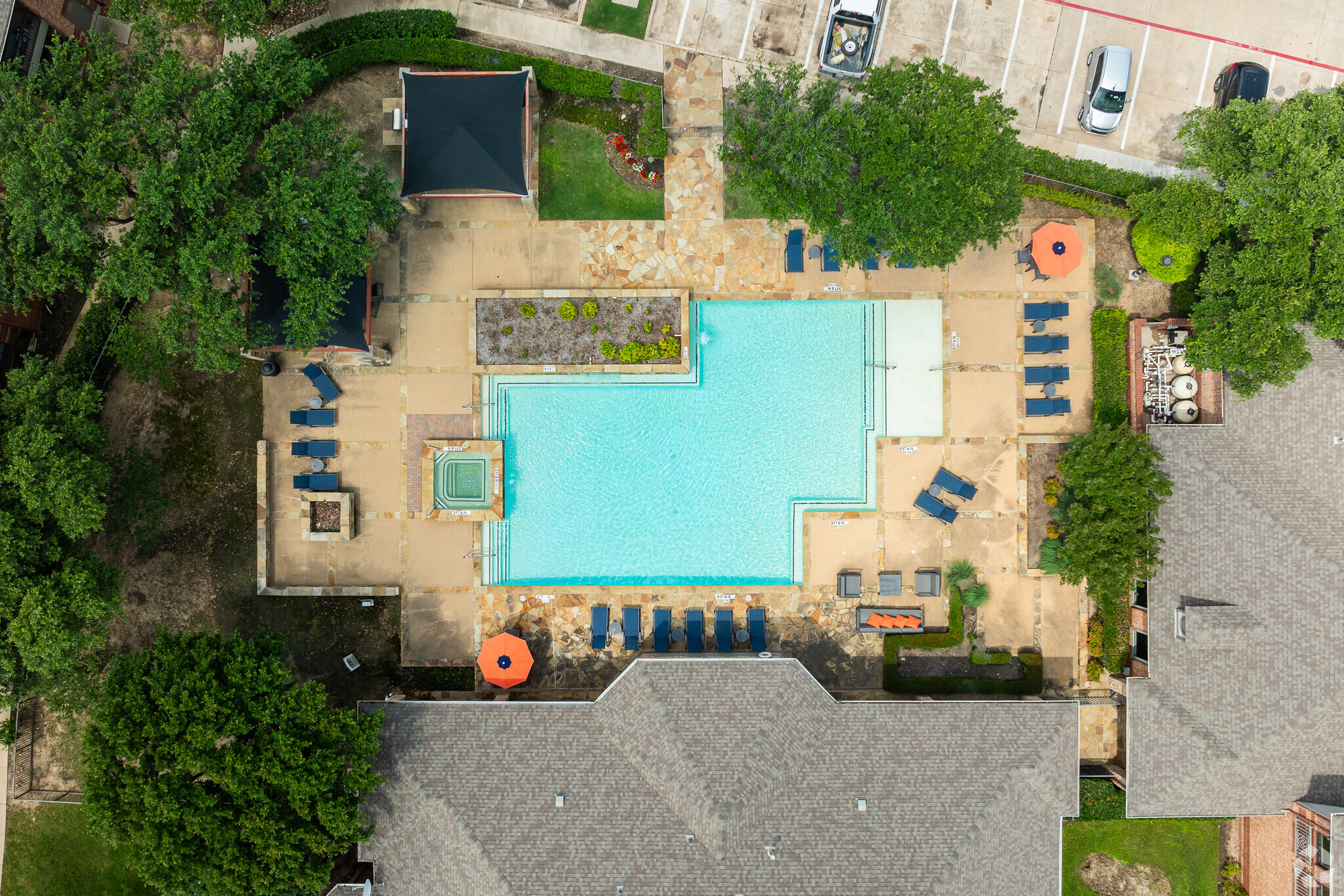 Aerial View of Sparkling Pool & Hot Tub - Oaks Riverchase Apartments