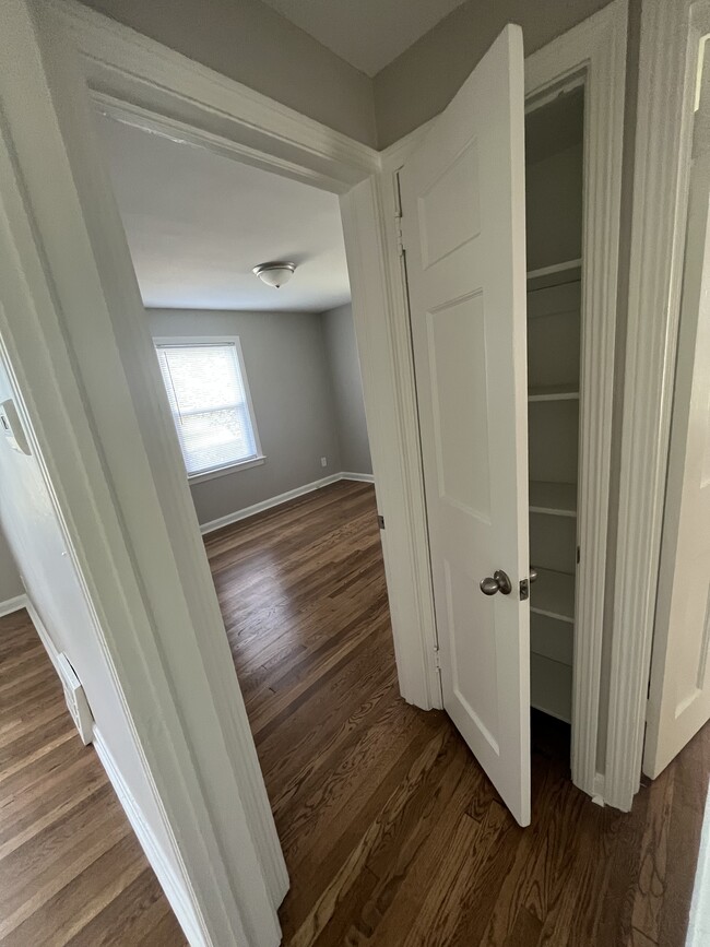 Linen closet and view into larger bedroom #1. - 24730 Lake Shore Blvd