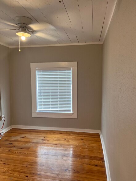 Bedroom number one with closet - 710 W Canal St