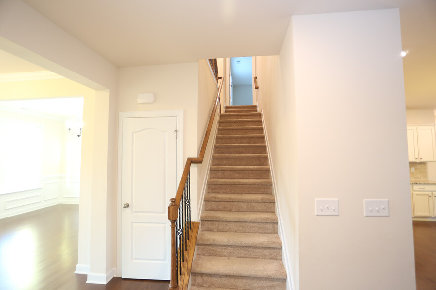 Stairs up from foyer - 2001 Trading Path Lane