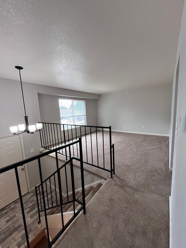 Building Photo - Welcome home to your updated 4-bedroom, 2 ...