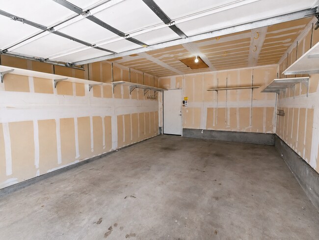 Building Photo - Spacious 2-Bedroom Condo with Garage, Fireplace, Pool & Most Included Utilities