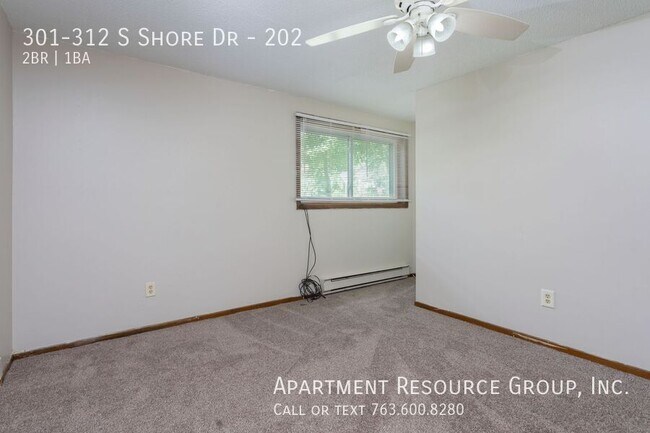 Building Photo - 301-312 S Shore Dr-202
