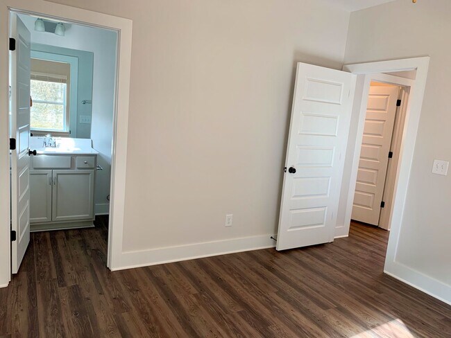 Building Photo - One level home with GARAGE and FENCED BACKYARD!