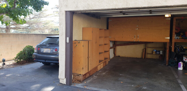 Outdoor parking space and shared 1/2 of 2-car garage LOTS OF STORAGE - 6716 Clybourn Ave