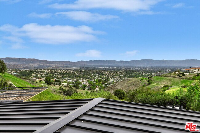 Building Photo - 24803 Wooded Vista