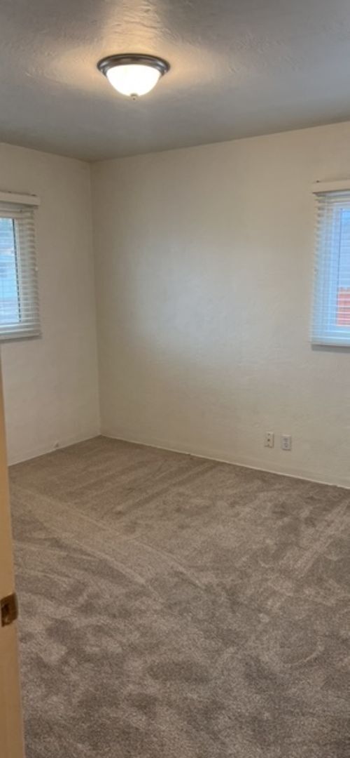 Building Photo - Nice 3 Bedroom 2 Bathroom, 2 Living areas. NE Heights, with plenty of room to roam inside and out