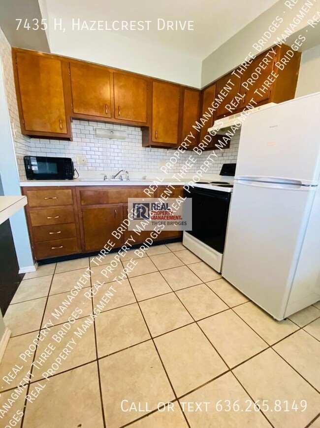 Building Photo - 7435 Hazelcrest Dr