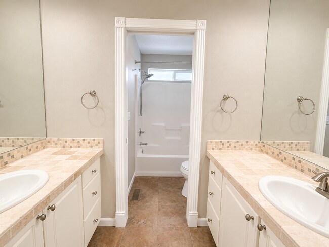 Building Photo - Light-Filled 3 Bedroom Retreat with Waterfall & Fully Fenced Yard