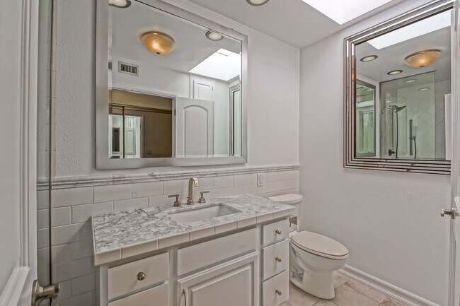 Building Photo - BRIGHT & AIRY, REAR-UNIT TOWNHOUSE W/ SPACIOUS PATIO, BALCONY & HUGE 2-CAR GARAGE IN GATED COMMUN...