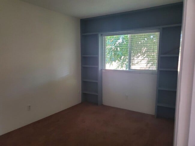 Building Photo - Corner lot detached SFR with a fenced yard in a wonderful neighborhood available 12/20/2025.