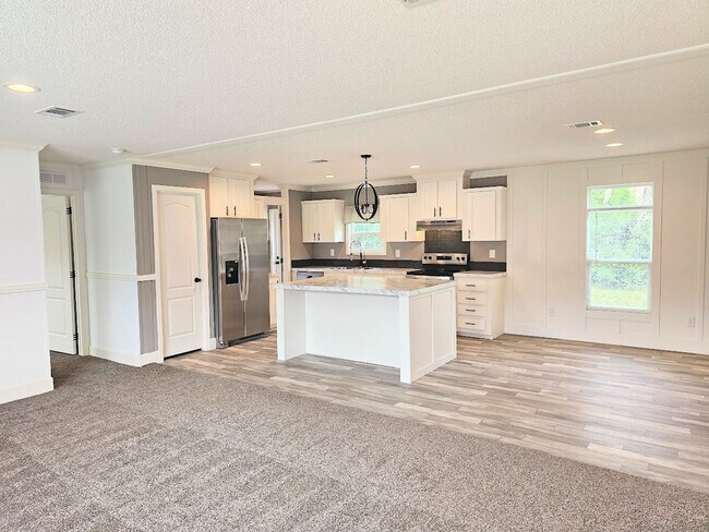 Building Photo - Welcome Home! Spacious 3-Bed, 2-Bath Split Floor Plan on ¾ Acre Lot