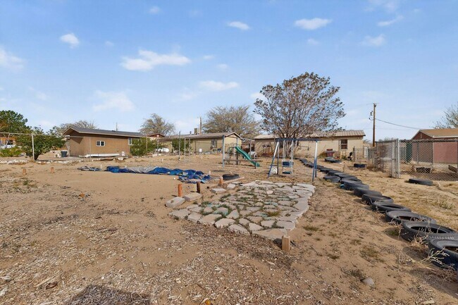 Building Photo - Rural South Valley 4 Bedroom  1.75 Bath 1256/sf