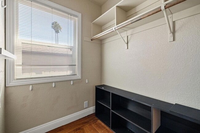 Building Photo - Welcome to this stunning 4-bedroom, 2-bath...
