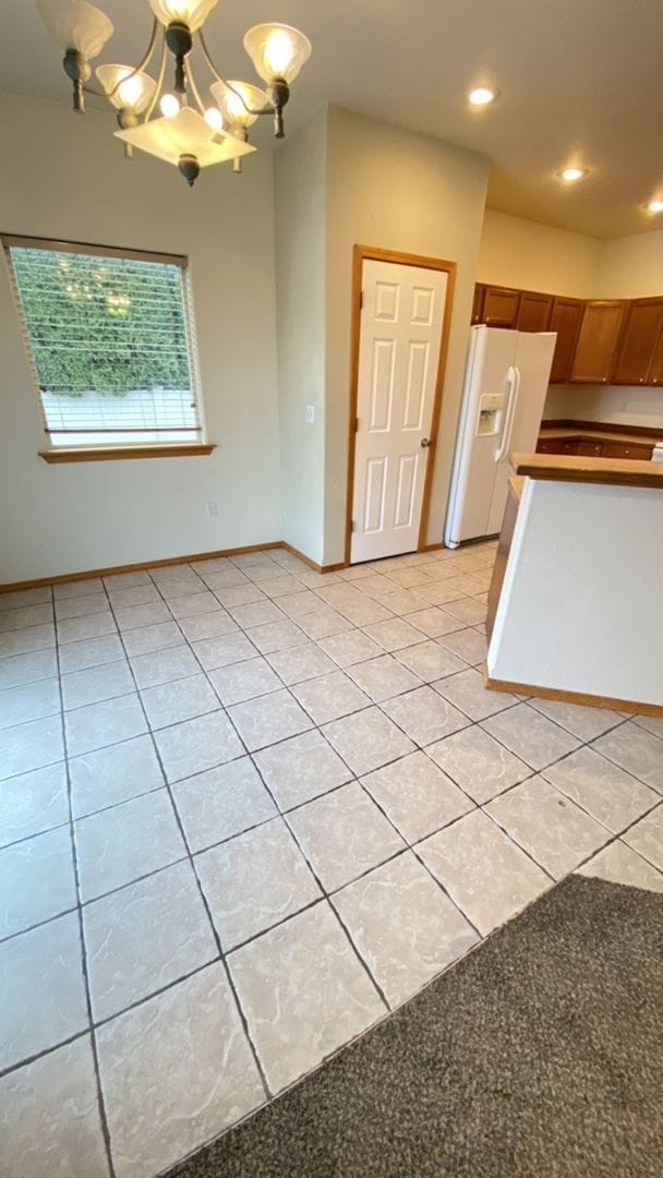 Building Photo - Triple Car Garage & New Interior Paint