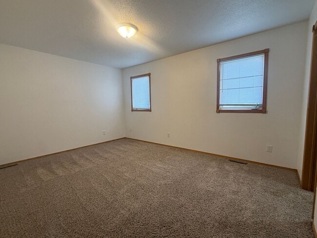 Building Photo - Spacious 3BR Home in Legacy School District with 3 Living Areas & 2-Stall Garage