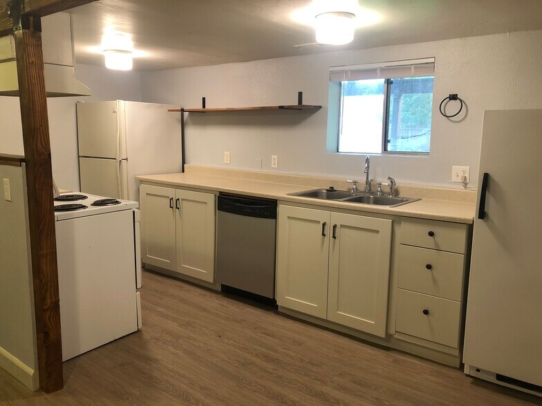 Kitchen (with upright fridge, upright freezer, dishwasher and range) - 105 W 2nd St Lower