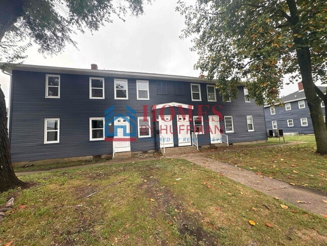 Building Photo - One Bedroom Apartment | Laundry Facility | Utilities Included