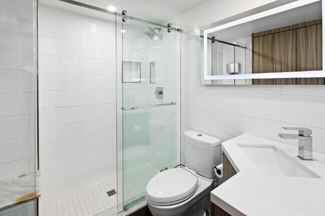 Building Photo - Live in one of San Diego’s most desirable locations in This award-winning architectural gem, "7 o...