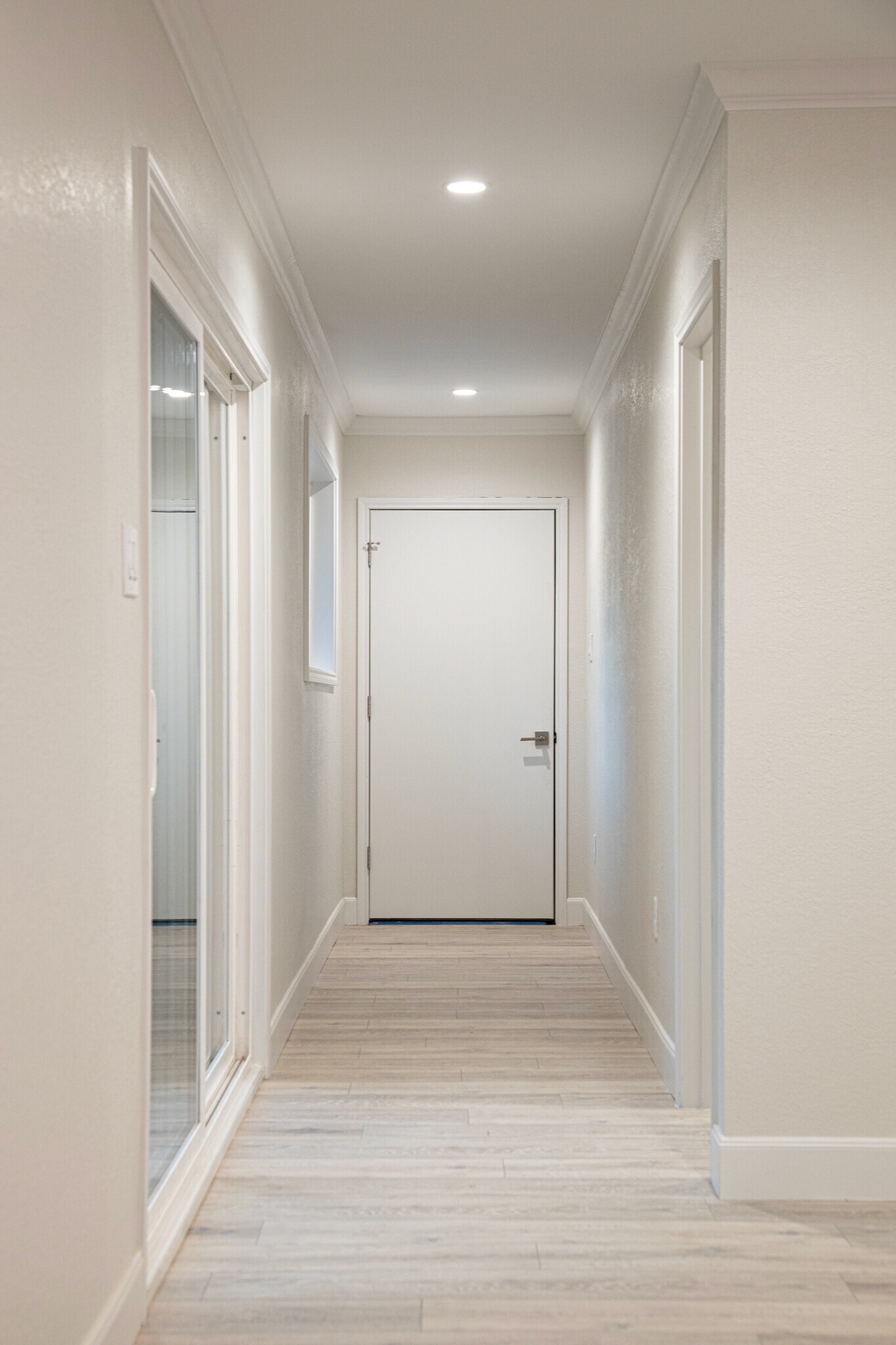 Hallway to carports and backyard - 3619 Braeswood S Blvd