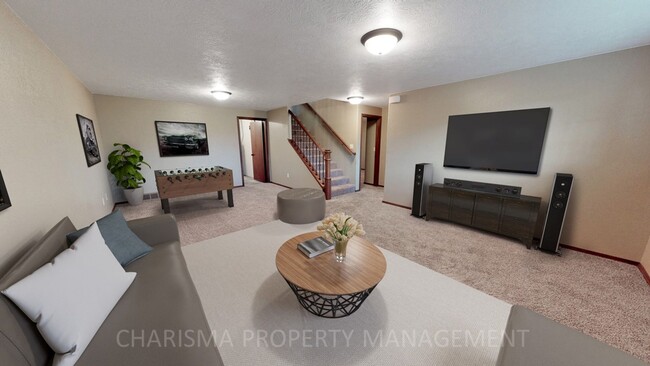 Building Photo - SPACIOUS AND AMENITY FILLED 3 BD, 2.5 BA T...