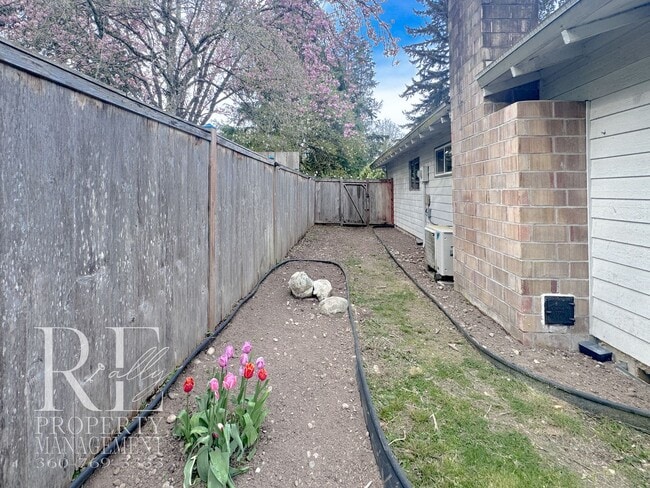 Building Photo - Bright & Spacious Single-Level Home with Dual Living Areas