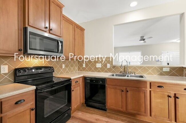 Building Photo - Cozy Townhome with Fireplace, Private Back Patio,  Near US-1, I-540 & Shopping