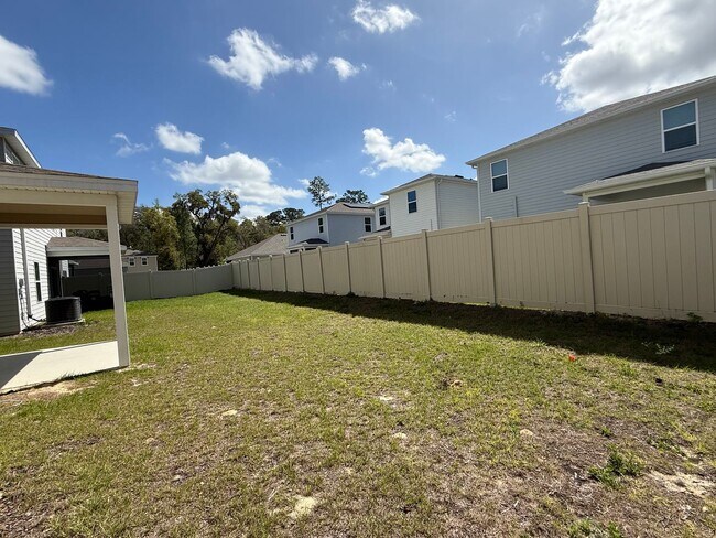 Building Photo - Spacious 4-Bedroom Modern Home in Oaks Preserve – Perfect Gainesville Location