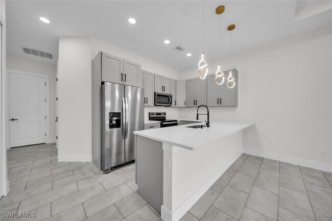 Building Photo - 4833-4835 Leonard Blvd S