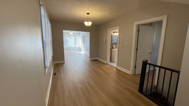 Building Photo - 6511 S Vernon Ave