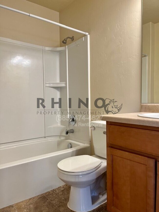 Building Photo - 6941 Village River Ln