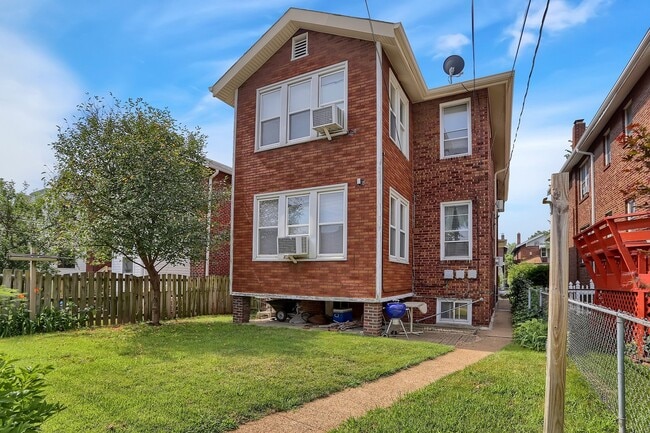 Building Photo - 4955 Tholozan Ave