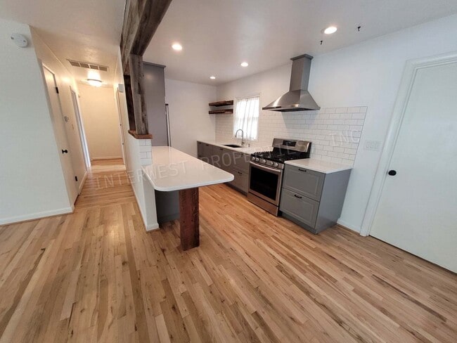 Building Photo - Beautiful 3 bdrm Home w/ a remodeled kitchen, stainless appliances, deck, yard and more!!!
