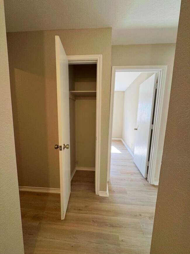 Building Photo - NEW PAINT, FLOORING, APPLIANCES & ROOF  | ...