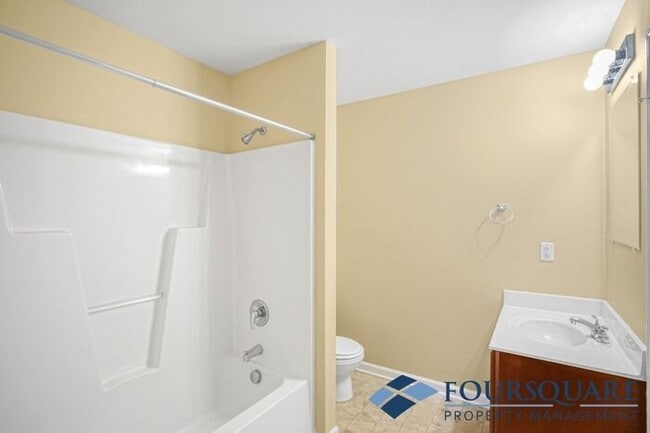 Building Photo - Charming 3-Bedroom Townhome with First-Floor Suite & Off-Street Parking – Near Capital Blvd & I-440