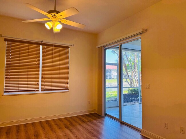 Building Photo - Experience Bell Tower Park. GATED ground floor 2 Bed 2 Bath Den 1 Car Garage Condo.