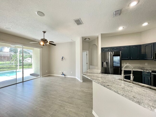 Building Photo - Gorgeous 3/2 Pool Home in Apopka's Parkside at Errol Estate!